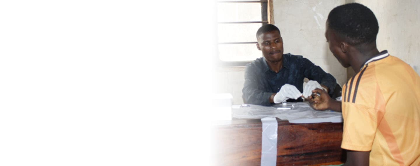 A young person receiving support at a KIVIDEA activity in Kigoma