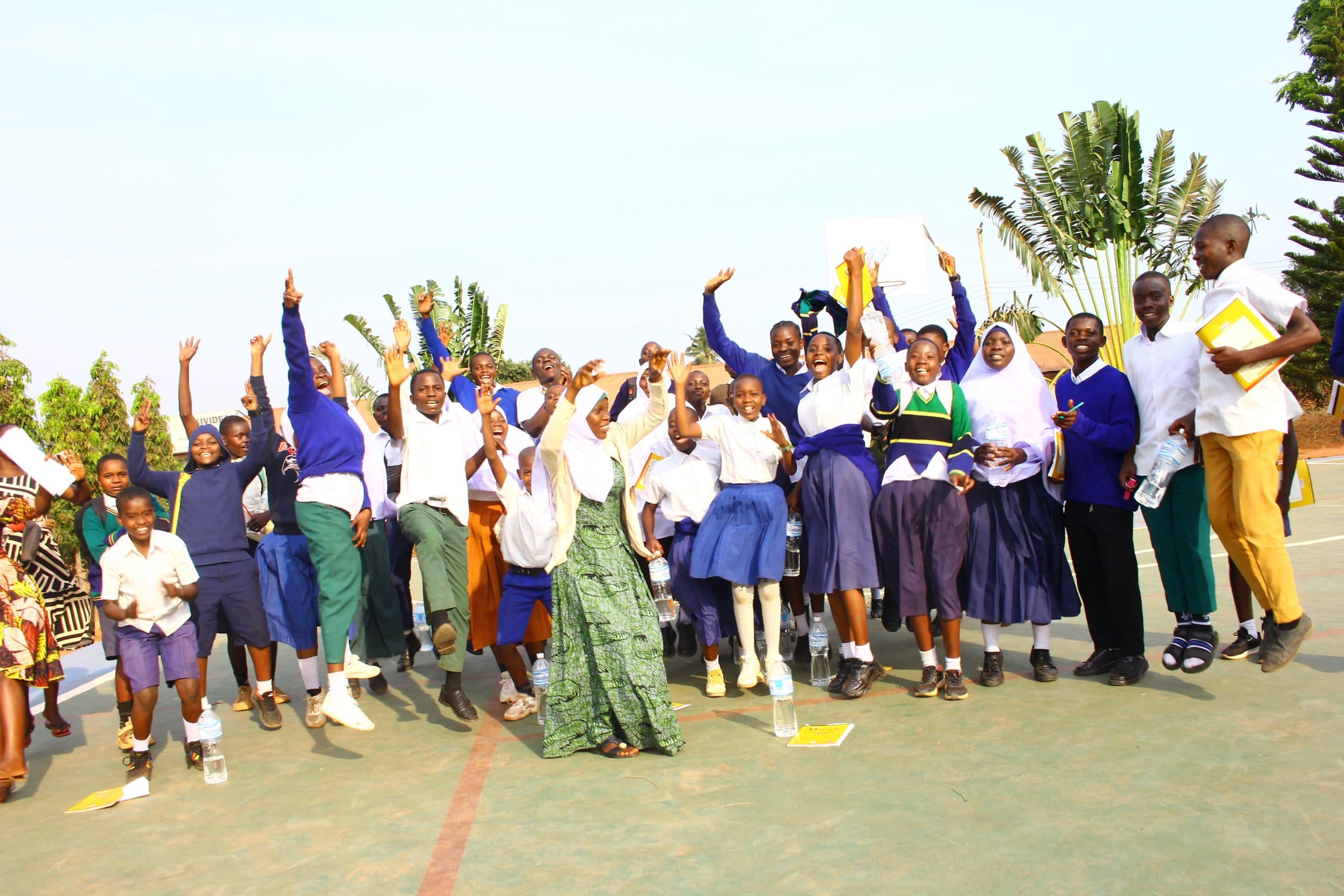 Young people celebrating together during a KIVIDEA activity